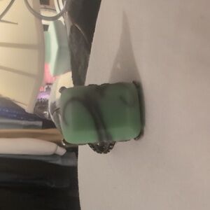 Large, chinky vintage 1960's mint green fashion ring; the large rectangular plas